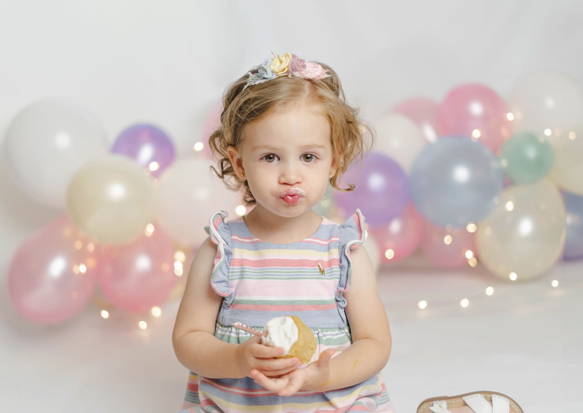 Cake Smash first birthday portrait 2 — Baby celebrating turning one in San Jose studio